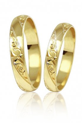 Snubn prsteny ze lutho zlata zdobeny run rytinou